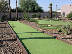 70’ bocce court and 5-hole extra large putting green with 3 chipping pads