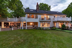 The house lit up as night approaches