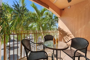 Grab some friends, a cocktail and sit amongst the palms to watch the nightly show known as "Sunset on Marco Island" from the western-facing balcony.