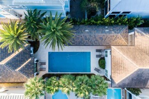 Main house right of pool, guest house left of pool. Outdoor living between both.