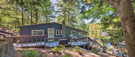 Stay on the peaceful Puscatquog River at this Weare vacation rental cottage!