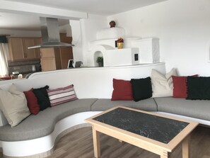 Couch / Living room area and open kitchen