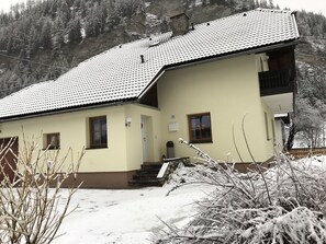 Winter view of Haus Bayliss after renovation. 