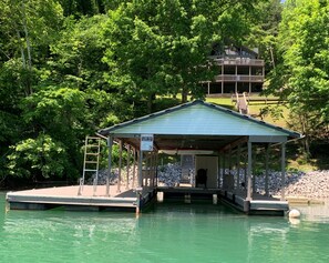 1 covered slip, 1 floating wave runner dock, and room to tie up 2 more boats