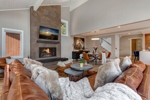 Remodeled Living Room with New Furnishings, a Gas Fireplace, and a Smart TV