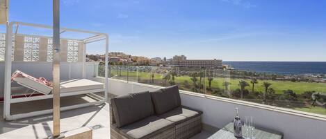 Amazing terrace at the top of the complex! Shower, sofas a glass of Prosecco..