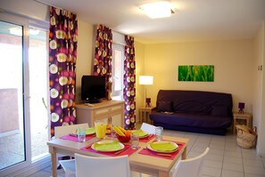 Welcome to our charming apartment by the beach!