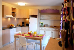 Share meals and laughs at the dining table.