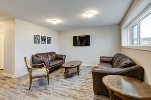 living room with comfortable, leather furniture