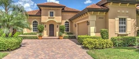 House front with two car garage