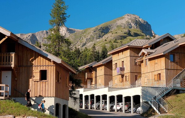Mountains and spruce trees surround the Residence