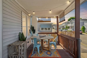 The porch boasts a large area to relax, eat dinner and take in the ocean breeze. Please respect our neighbor's privacy and keep noise levels to a minimum while out on the porch.