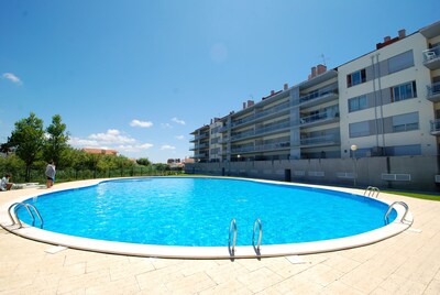Mar - Apartamento con piscina, parque infantil, 2 balcones, aire acondicionado y calefacción.