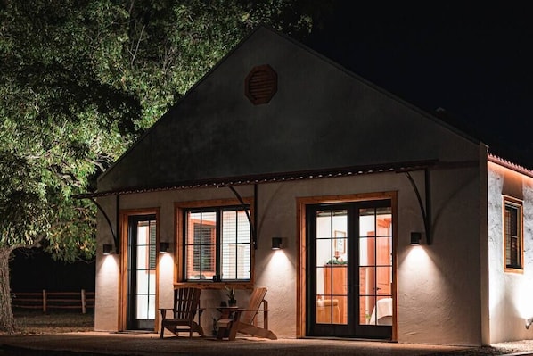Dutch Cabin at night with Outdoor seating