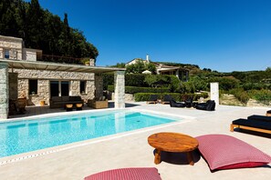 Sophisticated pool surroundings offering a sense of tranquility.