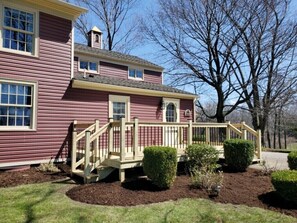 fresh mulch and new deck maintenance guy working hard