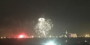 Disney fireworks from balcony view
