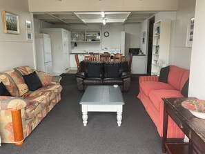 Living, dining, kitchen and bunk room on ground floor
