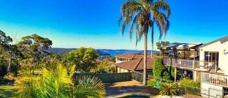 House and sea from the bush.