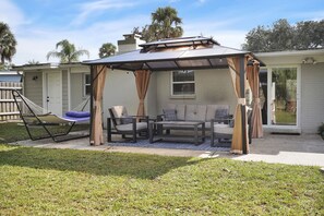 Padded hammock and covered pergola