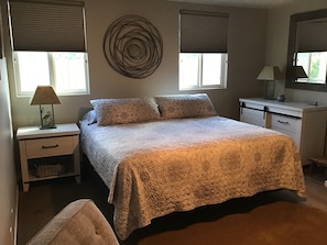 Large en suite master with king size bed 55 inch TV. And walk in closet