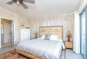 Master bedroom (king bed) w/ access to bathroom & front balcony. Ocean view too!