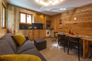 Living room with open plan kitchen