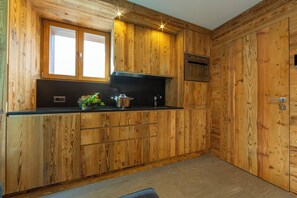 Kitchen with fridge and dishwasher