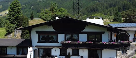 Mountain, Plant, Property, Building, Sky, Window, Cloud, Tree, Architecture, House