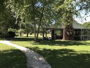 view of screen house from lodge screen porch
