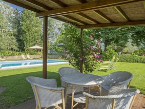 Plant, Flower, Botany, Shade, Tree, Outdoor Furniture, Grass, Interior Design, Leisure, Chair