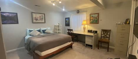 Spacious bedroom with Queen Bed and bathroom,  Kitchenette.and Large Work Table.