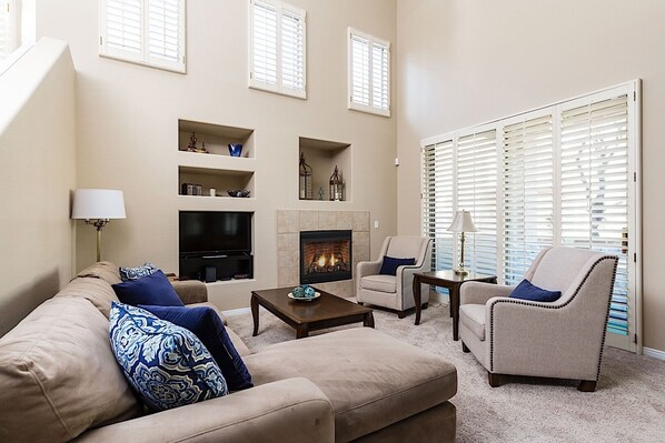 Bright open living room with vaulted ceilings
