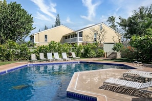 If you aren't up for the beach, the condoplex has its own pool for you to relax in. Plenty of lounge chairs to relax and soak up some sun.