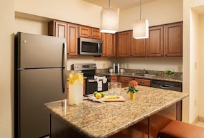 Cook up a storm in the fully-equipped kitchen and enjoy your food in the dining area.