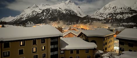 Cloud, Sky, Building, Snow, Property, Mountain, Window, White, Light, World