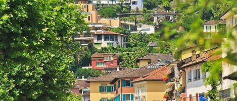 Neighbourhood, Residential Area, Town, Human Settlement, Urban Area, Metropolitan Area, City, Building, Mixed-Use, Suburb