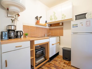 Cabinetry, Gebäude, Küchengerät, Countertop, Küche, Holz, Beleuchtung, Herd, Haushaltsgerät, Die Architektur