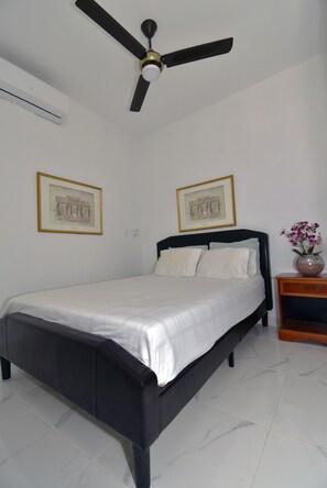 Bedroom 1 with fan and ac