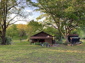 A view from the backyard, carport adds additional space to enjoy the outdoors. 