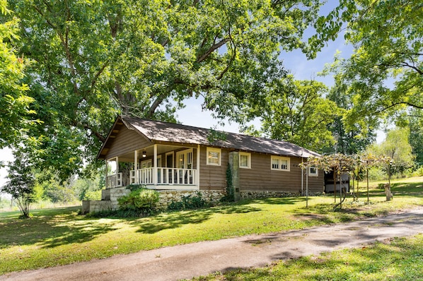 Welcome to this lovingly restored 100 year old home on a half acre shaded lot. 