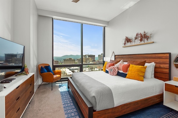 Bedroom with king bed, 55 inch TV