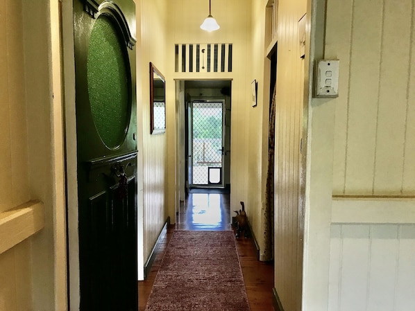 Hallway, beautiful high ceilings and fret work. 