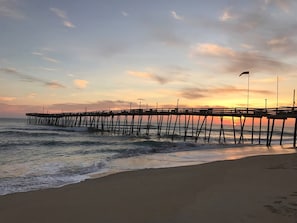 Avalon Pier at sunrise is an experience.  Let the Keurig brew your morning brew and take your Joe to go so you can watch the sun rise up over the horizon a peek through the pier.