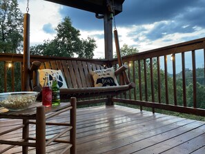 Spend hours on the main-level swing, enjoying the mountain views