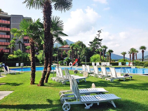 Water, Cloud, Sky, Mountain, Water Resources, Property, Plant, Nature, Body Of Water, Swimming Pool