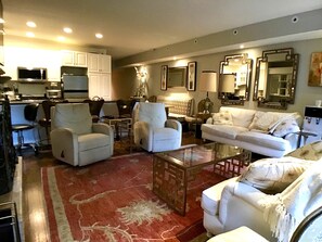 Open floor plan: living room, dining area, kitchen