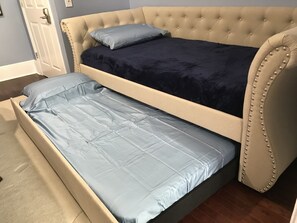 There is a twin bed with a twin trundle for additional sleeping accommodations.