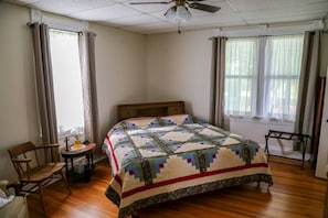 All bedrooms have new ceiling fans and newly finished original hardwood floors. 