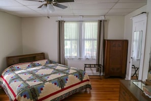 First Floor Bedroom with King Size bed and beautiful hardwood floors.